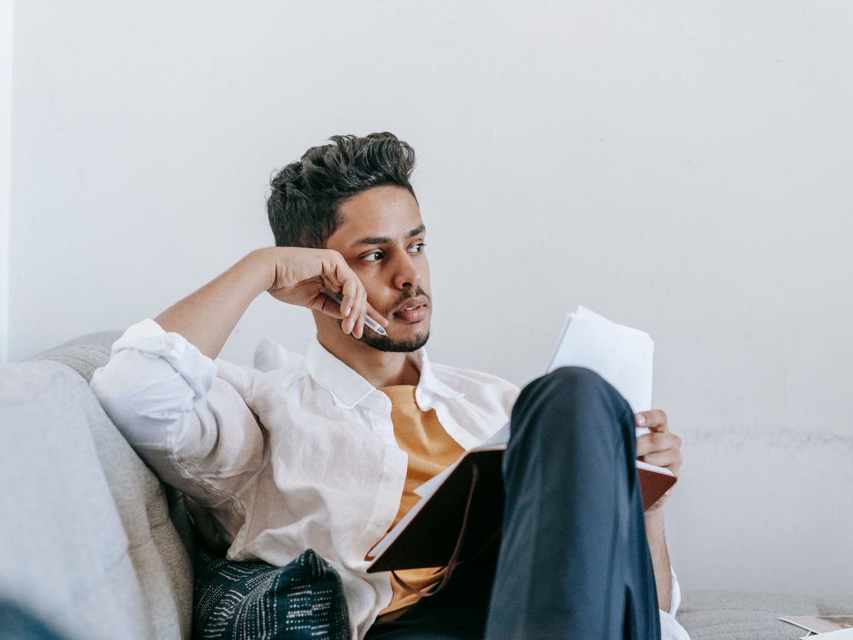 A man at home, thinking over the advised surgery